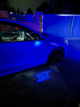 Load image into Gallery viewer, “ST” Emblem Replacement Puddle Unit - MK4 / MK4.5 Focus ST (Multiple Colours)