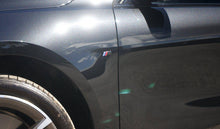 Load image into Gallery viewer, Genuine BMW Gloss Black Fender Badges Pair - Jet Black 668 OEM Side Wing/Vent Emblems for M Sport 1 2 3 4 Series (F20 F21 F40, F22 F23 F44, F30 F31 G20 G21, F32 F33 F34 G22)