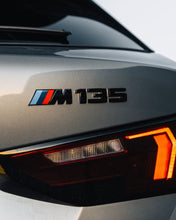 Load image into Gallery viewer, BMW M135i M Performance Black High Gloss Model Badge – Genuine OEM Emblem for 1 Series M135i/M135 xDrive (F20 F21 F40 F70) 2011–2025 Rear Boot/Tailgate