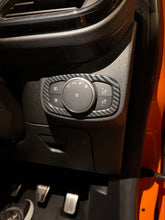 Load image into Gallery viewer, Ford Focus MK4 / MK4.5 - Carbon Fibre Look Headlight Control Panel Surround
