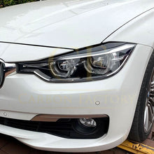 Load image into Gallery viewer, Gloss Black Headlight Trims for BMW F30 F31 3 Series 12-19
