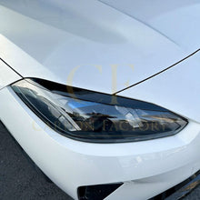 Load image into Gallery viewer, Gloss Black Headlight Trims for BMW F70 1 Series 25-Present
