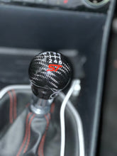 Load image into Gallery viewer, Genuine Carbon Fibre Gear Knob with Red ST Logo – Fits Most Manual Ford Models
