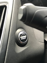 Load image into Gallery viewer, CEUK Logo Start Button Gel Overlay – Black &amp; Chrome for MK7 Fiesta / MK3 Focus

