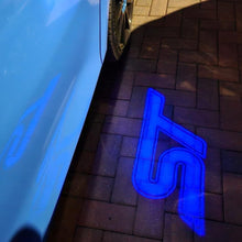 Load image into Gallery viewer, “ST” Emblem Replacement Puddle Unit - MK4 / MK4.5 Focus ST (Multiple Colours)
