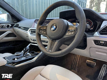 Load image into Gallery viewer, TRE Pre-Preg Carbon Fibre Steering Wheel Trim Accent for BMW M Sport Models (2018+, F40 F44 G20 G21 G42 G30)
