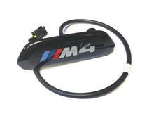 Load image into Gallery viewer, Genuine BMW M4 F82 F83 Seat Backrest Trim Cover - Gloss Black with Illuminated M Emblem | OEM Fit 2013-2019 Coupe/Convertible (LCI/GTS) | P/N 52109503039 | Driver or Passenger
